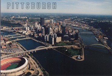 Featured is a postcard image of the city of Pittsburgh, Pennsylvania which highlights its many bridges and the city's situation on three rivers.  The original 1990s unused postcard is for sale in The unltd.com Store.